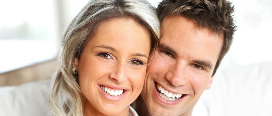 Woman and man with good vision after restoration.